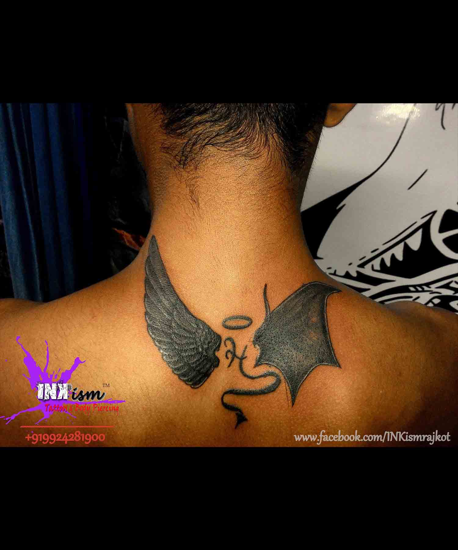 Angel and Demon wings tattoo, angel wings tattoo, Demon wing tattoo, calligraphy tattoo, Inkism tattoo and body piercing rajkot gujarat