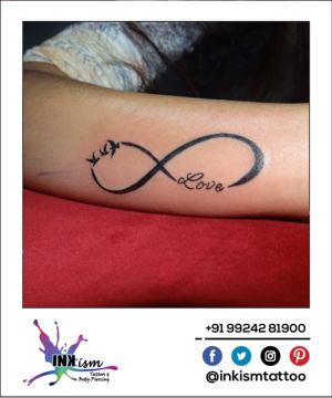 Infinity with calligraphy and birds tattoo, Infinity tattoo, Birds tattoo, Calligraphy tattoo, Inkism tattoo and body piercing rajkot gujarat