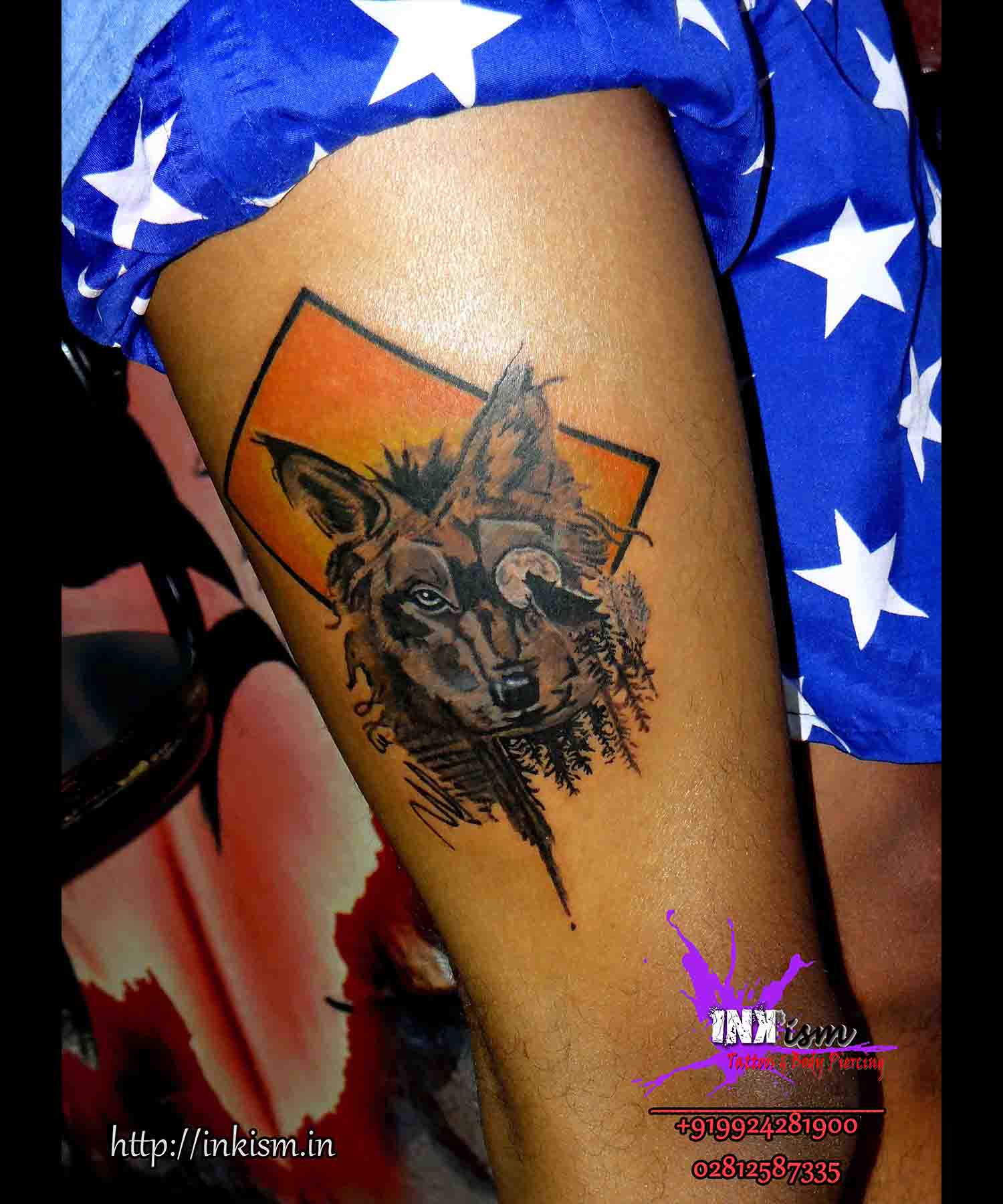 Wolf grey wash tattoo, Wolf tattoo, Color tattoo, jungle tattoo, Inkism tattoo and body piercing rajkot gujarat